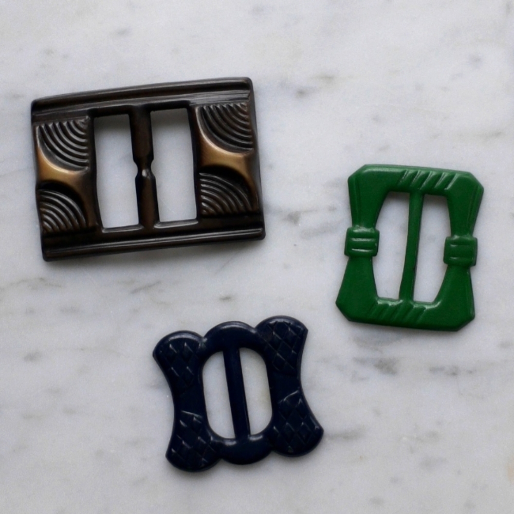 2/$20 Vintage Celluloid Belt Buckle Trio